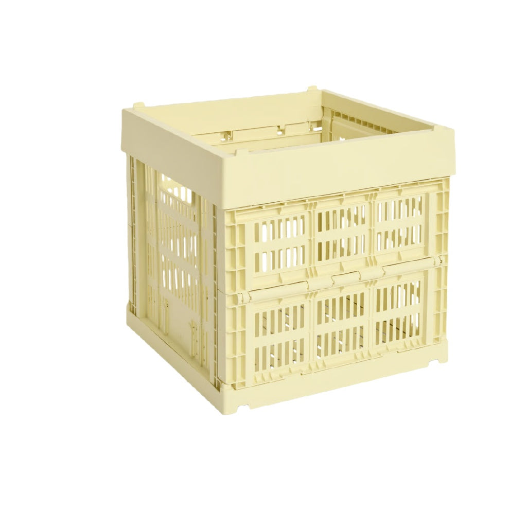 Caja plegable de plástico con estructura ventilada, color crema